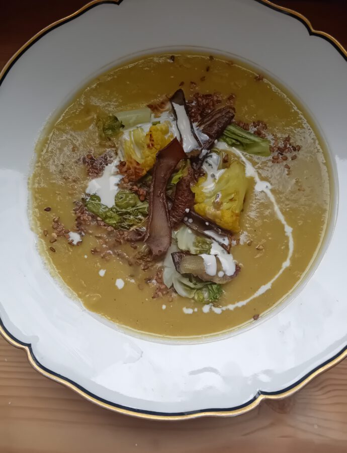 Soup with Roasted Cauliflower, Celeriac and Potato with Cauliflower Leaves and Potato Peels